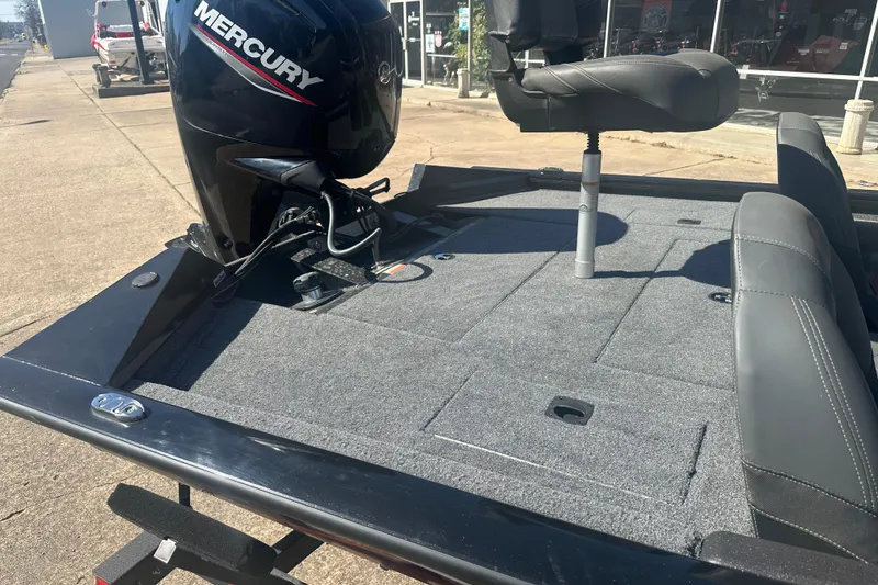 Slide: The Image of 2024 Tracker Pro Team 175 TXW boat with Mercury engine, rear deck view. - 9