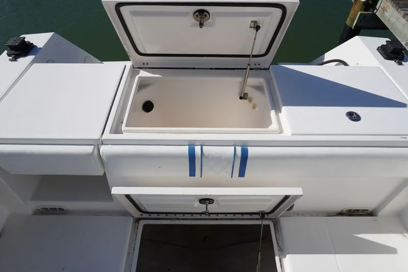 Slide: The Image of Regulator 32 boat with open storage compartment, year 2005. - 33