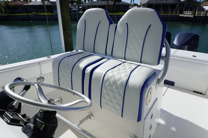 Slide: The Image of Regulator 32 boat seating with blue accents, year 2005. - 45