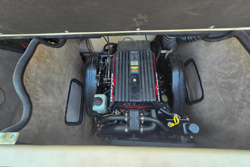 Slide: The Image of Engine compartment of a 1997 Bryant 182 boat with MerCruiser 3.0 LX engine. - 8