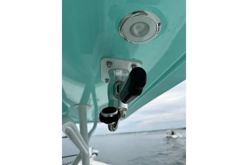 Slide: The Image of Close-up of Stanley White Fishmaster 2026 boat's rod holder and light fixture. - 10