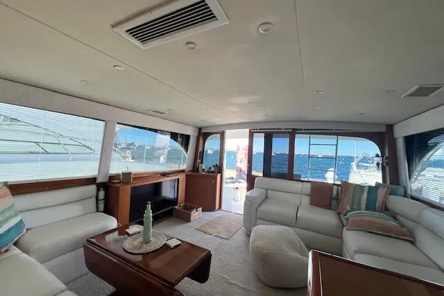 Slide: The Image of Luxurious interior of a 1995 Post 50 Convertible yacht with ocean view. - 11