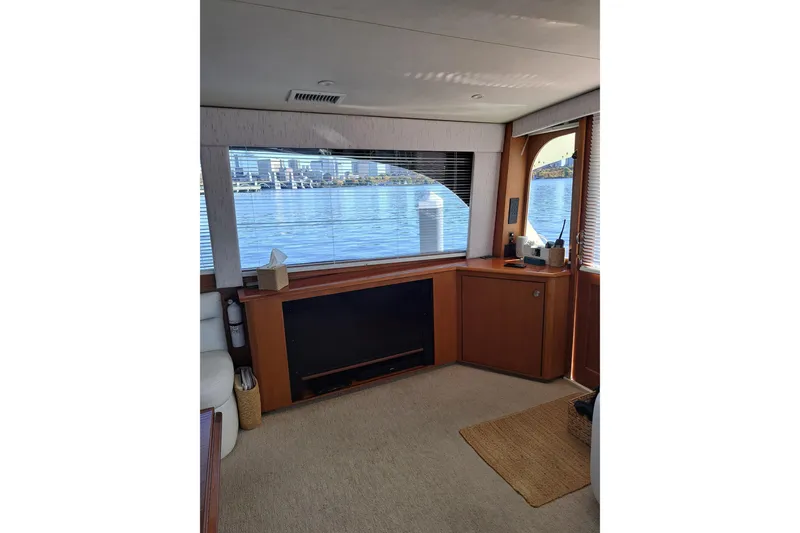 Slide: The Image of Interior of a 1995 Post 50 Convertible yacht with waterfront view. - 16