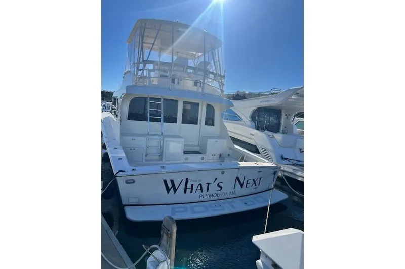 Slide: The Image of 1995 Post 50 Convertible yacht named "What's Next" docked in Plymouth, MA. - 5