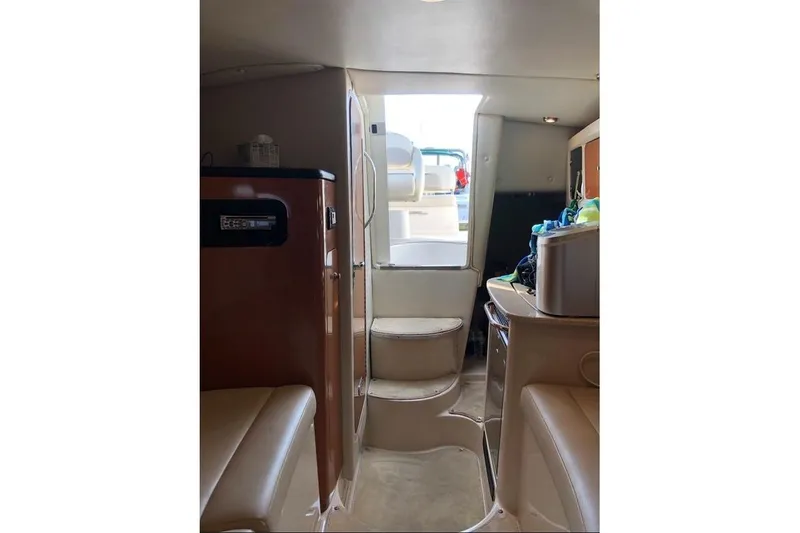 Slide: The Image of Interior view of 2008 Chaparral Signature 270 boat, featuring steps and seating area. - 8