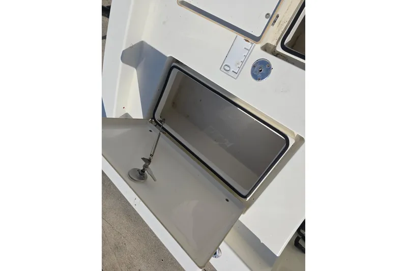 Slide: The Image of Open storage compartment on 2016 Pathfinder 2600 HPS boat deck. - 15