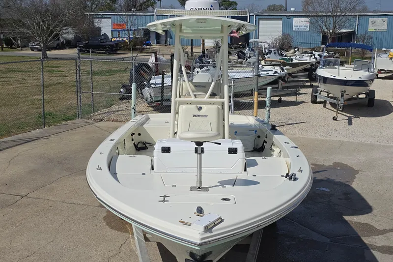 Slide: The Image of 2016 Pathfinder 2600 HPS boat displayed outdoors at a dealership. - 26