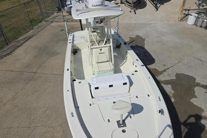Slide: The Image of 2016 Pathfinder 2600 HPS boat with Garmin equipment, docked on concrete surface. - 27