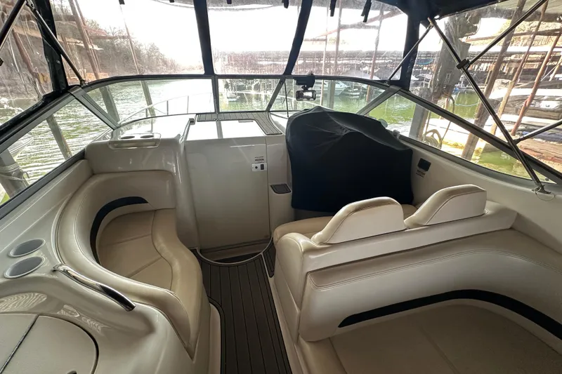 Slide: The Image of Interior of 2000 Chaparral Signature 300 boat with seating and helm. - 10