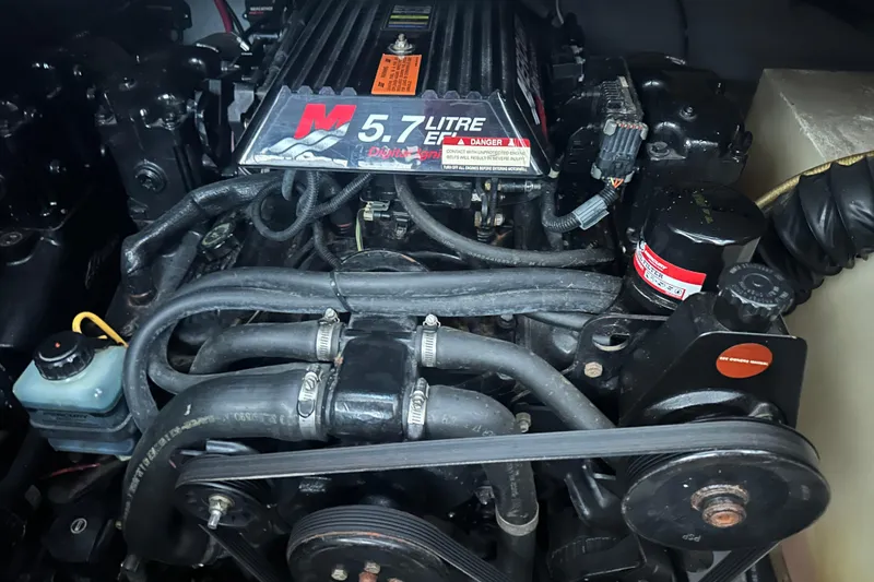 Slide: The Image of Engine of 2000 Chaparral Signature 300 boat, featuring 5.7-liter V8 motor. - 37