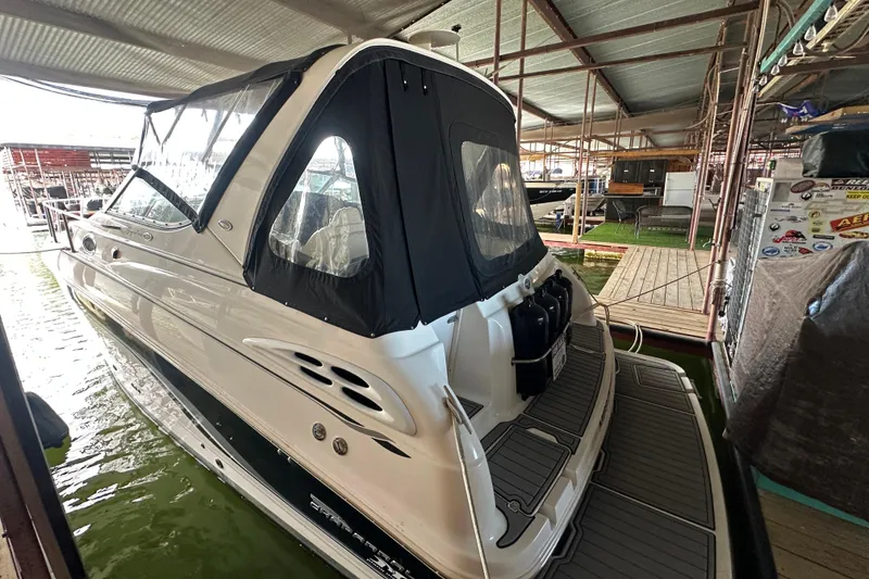 Slide: The Image of Chaparral Signature 300 boat, 2000 model, docked in a covered marina. - 5