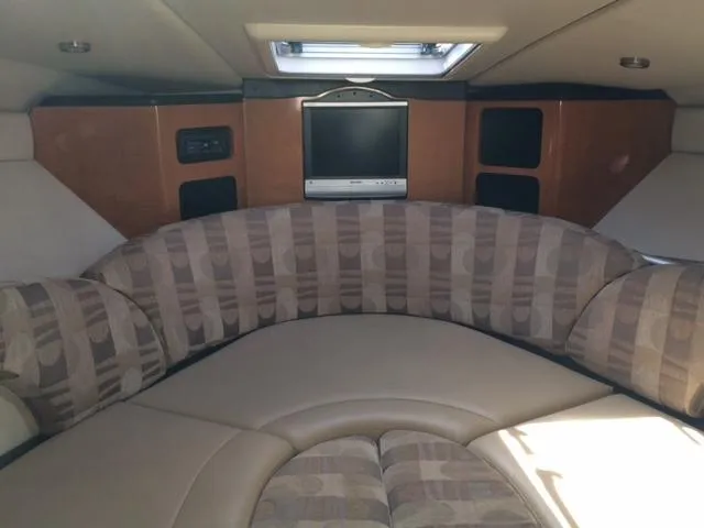 Slide: The Image of 2007 Chaparral 275 SSi cabin interior with seating and entertainment system. - 6