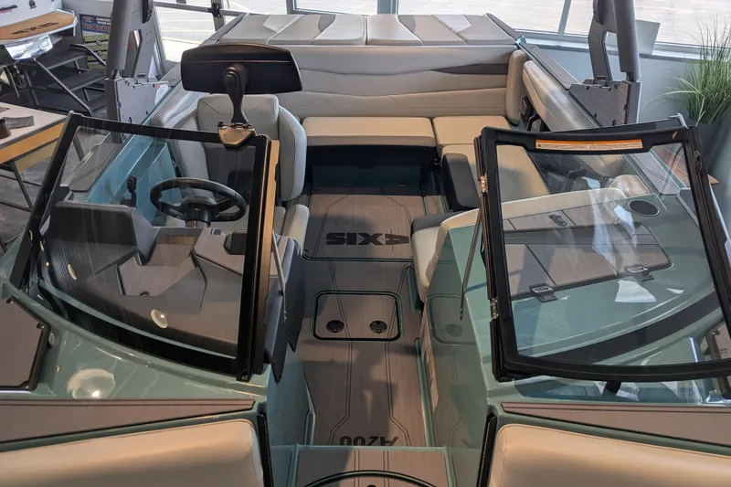 Slide: The Image of Interior view of 2026 Axis A200 boat, featuring modern seating and sleek design. - 13