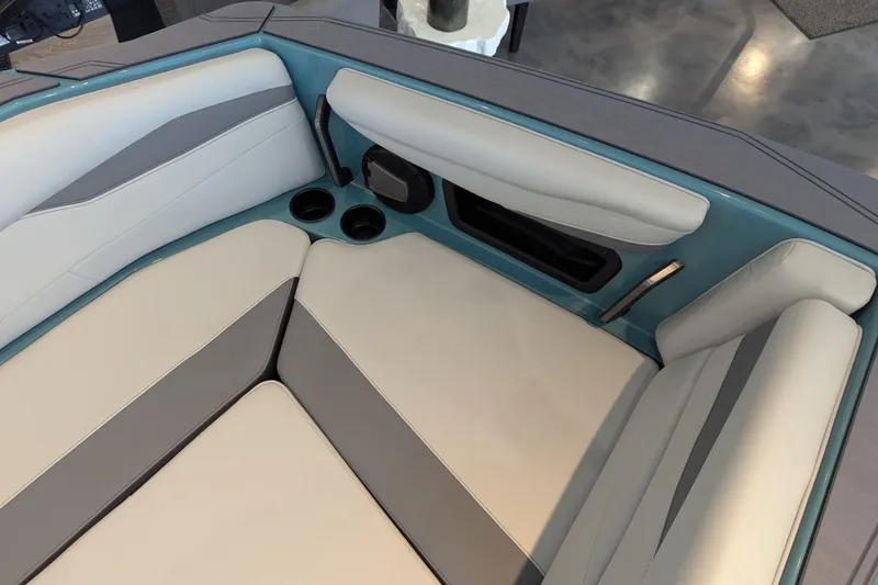 Slide: The Image of 2026 Axis A200 boat interior with cushioned seating and cup holders. - 15