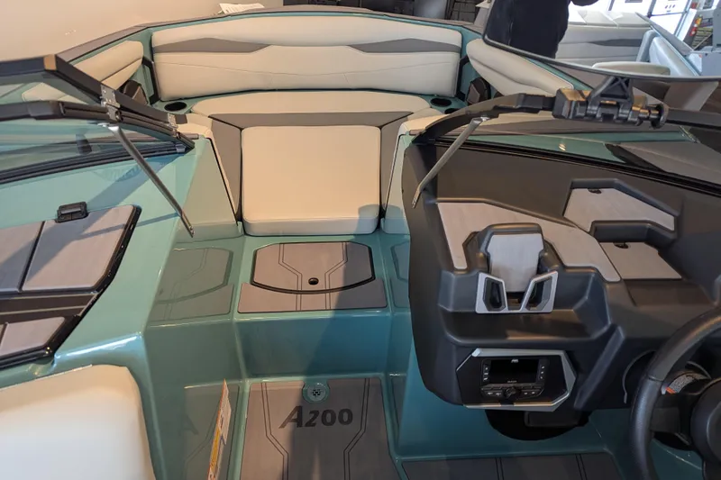 Slide: The Image of 2026 Axis A200 boat interior with modern dashboard and seating. - 6
