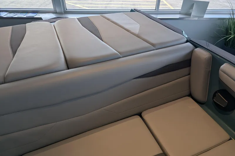 Slide: The Image of 2026 Axis A200 boat interior with sleek, modern seating design and comfortable upholstery. - 9