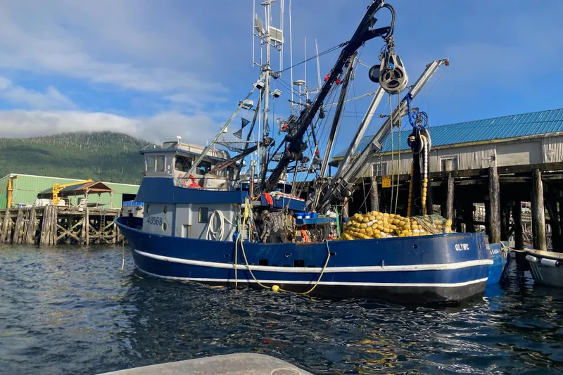 Slide: The Image of 1976 Custom 54 Steel Fishing Vessel docked, loaded with fishing gear and nets. - 8