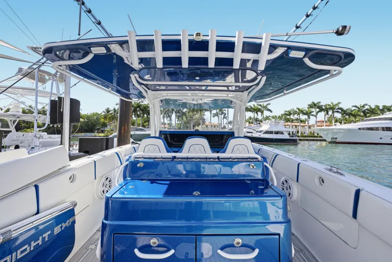 Slide: The Image of 2019 Midnight Express 43 Open boat with sleek blue interior and spacious deck. - 5