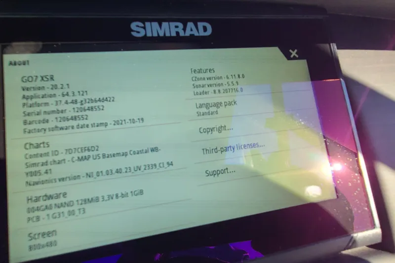 Slide: The Image of Simrad GO7 XSR display on 2023 Bennington L23, showing software and hardware details. - 8