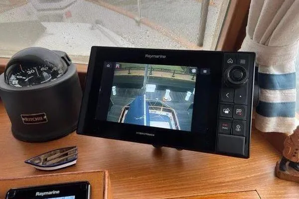 Slide: The Image of Raymarine navigation system on 2000 Grand Banks 36 Classic yacht dashboard. - 10