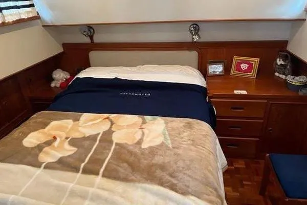 Slide: The Image of Cozy bedroom in 2000 Grand Banks 36 Classic yacht with wooden furnishings. - 21