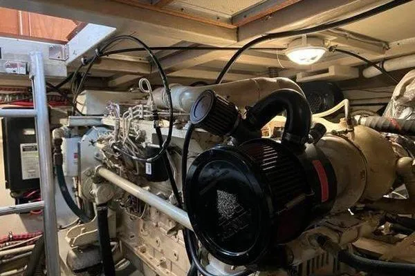 Slide: The Image of Engine room of 2000 Grand Banks 36 Classic yacht, showcasing detailed machinery and components. - 28