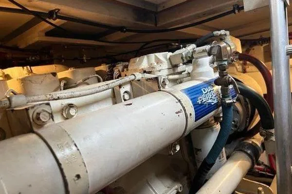 Slide: The Image of Engine compartment of 2000 Grand Banks 36 Classic boat, showcasing mechanical components. - 30