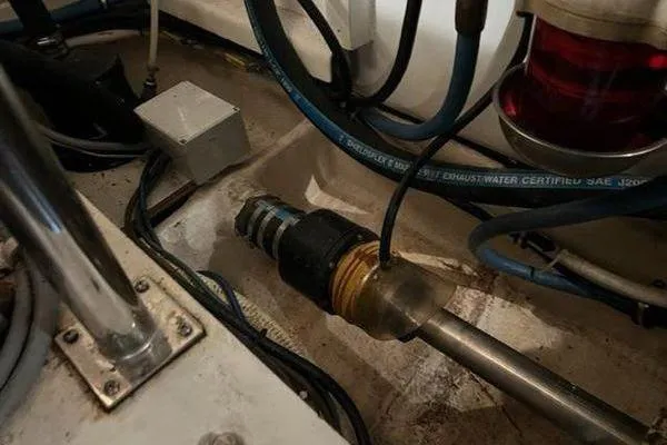 Slide: The Image of Engine compartment of 2000 Grand Banks 36 Classic with visible wiring and components. - 32