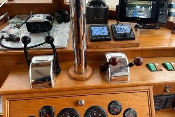Slide: The Image of Grand Banks 36 Classic 2000 helm with controls, gauges, and navigation equipment. - 8
