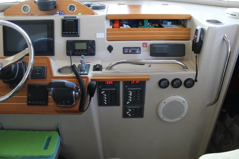 Slide: The Image of Aspen B100 2016 boat dashboard with navigation controls and instruments. - 19