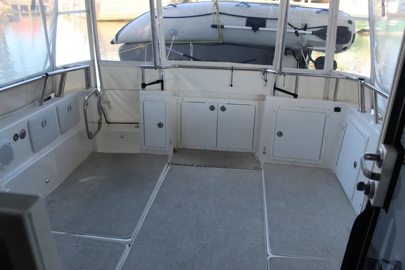 Slide: The Image of Spacious interior of 2016 Aspen B100 boat with storage compartments and clean design. - 23