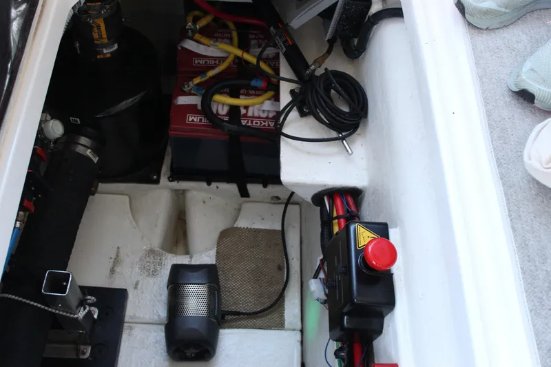 Slide: The Image of Engine compartment of 2016 Aspen B100 boat with battery and wiring. - 8
