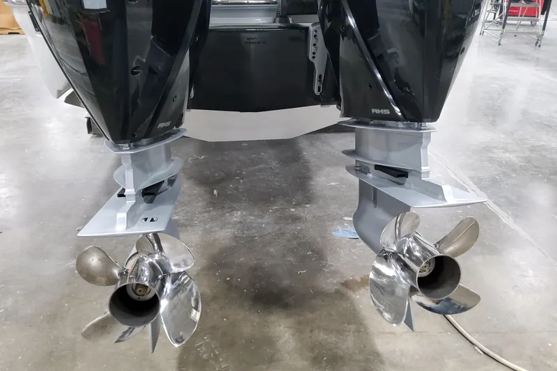 Slide: The Image of 2026 Formula 310 Bowrider OB dual outboard motors with stainless steel propellers. - 14