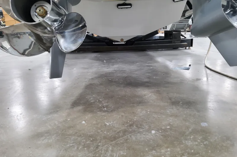 Slide: The Image of 2026 Formula 310 Bowrider OB propellers on display in a showroom. - 16