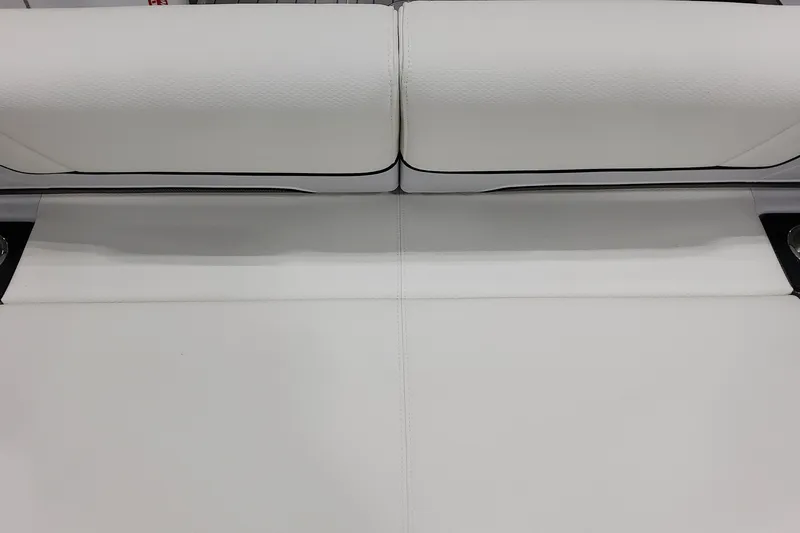 Slide: The Image of 2026 Formula 310 Bowrider OB white leather seating detail. - 28