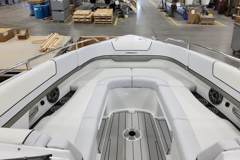 Slide: The Image of 2026 Formula 310 Bowrider OB interior with spacious seating and modern design in a workshop. - 31