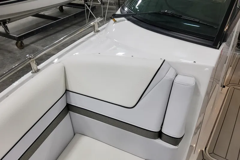 Slide: The Image of 2026 Formula 310 Bowrider OB interior with white seating and sleek design. - 34