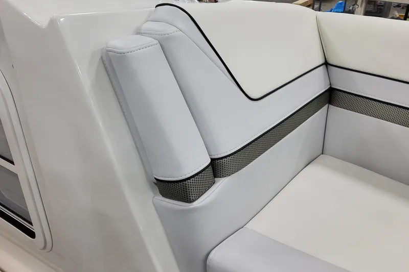 Slide: The Image of 2026 Formula 310 Bowrider OB interior seating with white upholstery and sleek design. - 40
