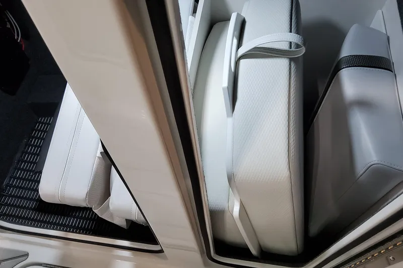 Slide: The Image of 2026 Formula 310 Bowrider OB interior seating with white cushions and sleek design. - 51