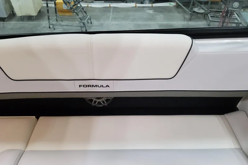 Slide: The Image of 2026 Formula 310 Bowrider OB interior seating with sleek white upholstery. - 65