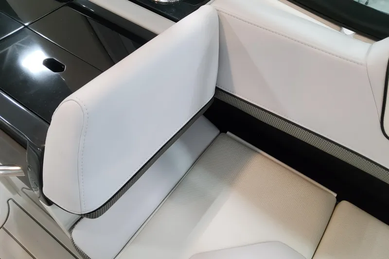 Slide: The Image of 2026 Formula 310 Bowrider OB interior seating with sleek white upholstery and modern design. - 69