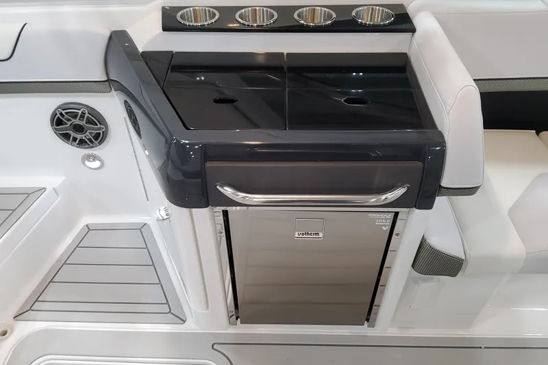 Slide: The Image of 2026 Formula 310 Bowrider OB boat interior with sleek kitchenette and modern design. - 70