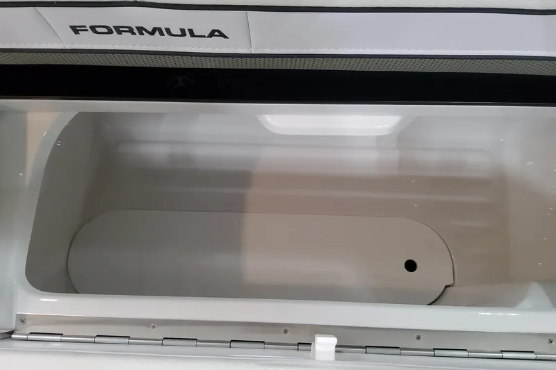 Slide: The Image of Open storage compartment in 2026 Formula 310 Bowrider OB boat. - 72