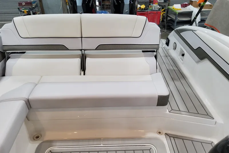 Slide: The Image of 2026 Formula 310 Bowrider OB boat interior with sleek seating and modern design. - 74