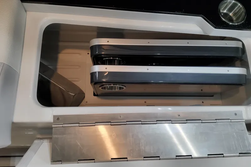 Slide: The Image of Storage compartment in 2026 Formula 310 Bowrider OB boat, featuring sleek design and modern amenities. - 83