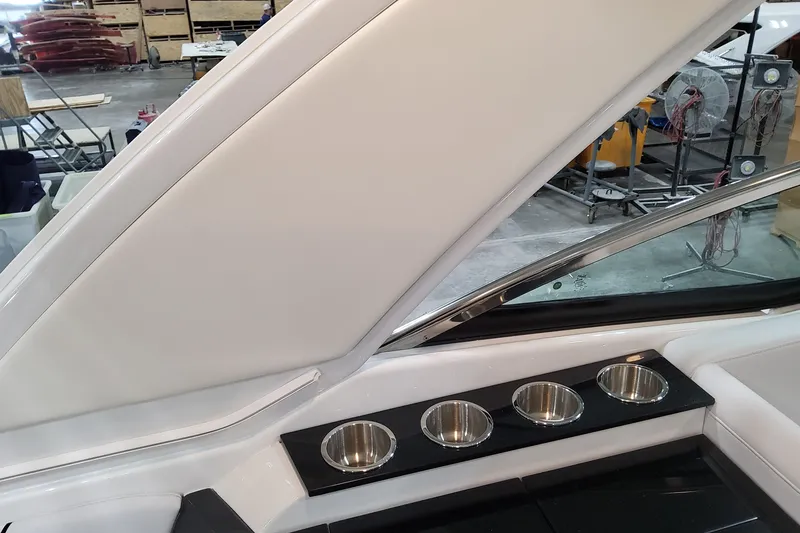 Slide: The Image of 2026 Formula 310 Bowrider OB interior with sleek design and stainless steel cup holders. - 89