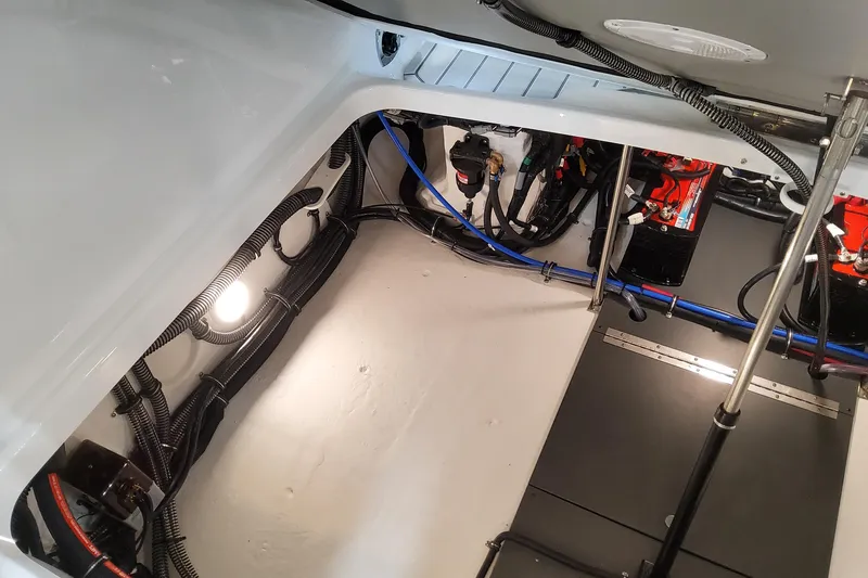 Slide: The Image of Engine compartment of 2026 Formula 310 Bowrider OB, showcasing wiring and components. - 91