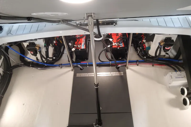 Slide: The Image of Engine compartment of 2026 Formula 310 Bowrider OB, showcasing wiring and components. - 92