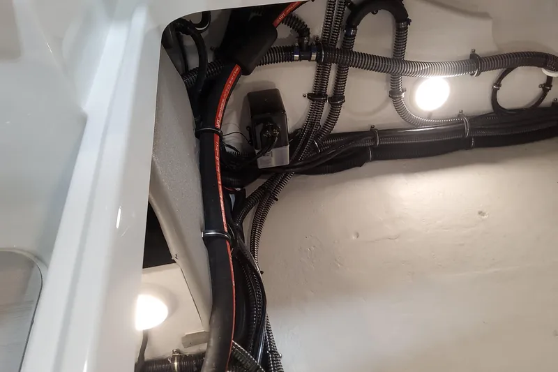 Slide: The Image of 2026 Formula 310 Bowrider OB wiring and lighting detail in boat interior. - 97