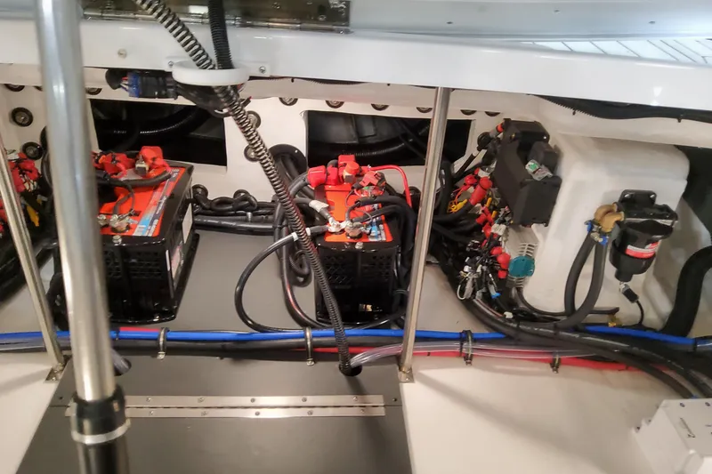 Slide: The Image of Electrical system of 2026 Formula 310 Bowrider OB boat, showcasing batteries and wiring. - 99